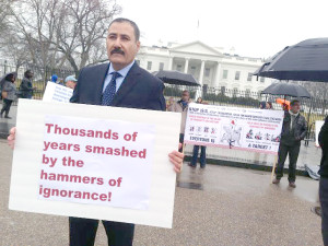 A protester is seen Tuesday outside the White House to urge the administration to stop ISIS from destroying ancient artifacts in Iraq and Syria. (Marie Helene Carleton/Four Corners Media)