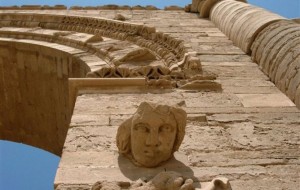 In this July 27, 2005 file photo, the face of a woman stares down at visitors in the Hatra ruins, 200 miles north of Baghdad, Iraq. Iraq's minister of tourism and antiquities told the AP on Saturday that the government is investigating reports that the ancient archaeological site of Hatra in northwestern Iraq is being demolished by militants from the Islamic State group. (AP)